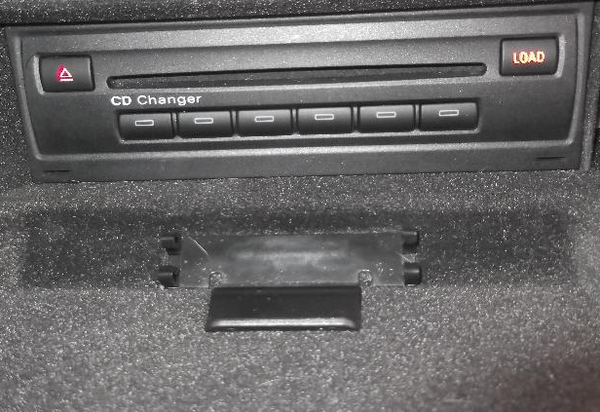 Q7 and C6 with 6 CD changer in glove box.png